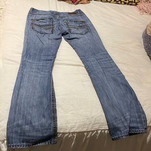 Denim Buckle boot cut low rise jeans